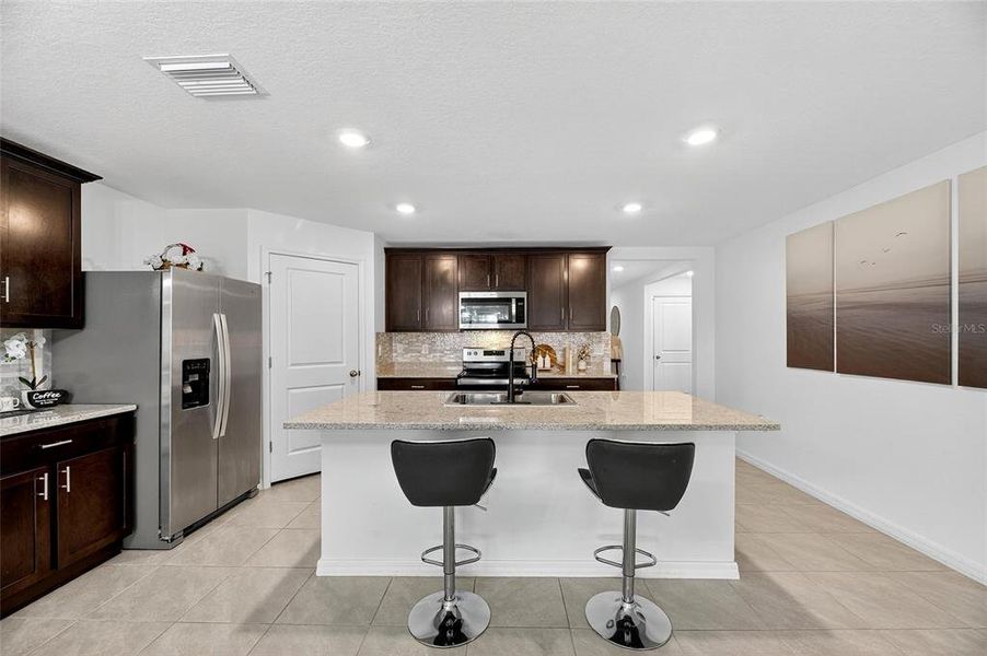 Furnished interior view inside a new home in North Park Isle, Plant City (Image 16).