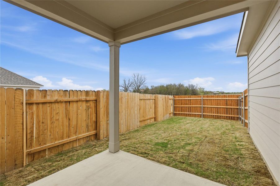 Exterior details and patio area of a home in Infinity Square, Kyle (Image 3).
