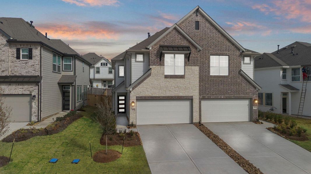 Front exterior of a new home in Woodforest, Montgomery, TX, highlighting curb appeal (Image 2). Front exterior of a new home in Woodforest, Montgomery, TX, highlighting curb appeal (Image 2).