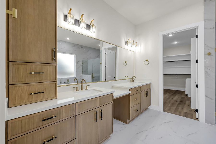 Relax in the owner’s retreat spa-like bathroom with large soaking tub, spacious walk-in shower and double vanities.