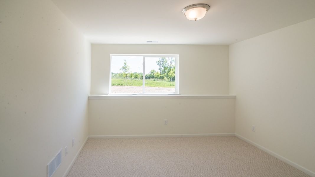 Representative unfurnished interior of a home built from the The Briarhaven III Side Entry by Norfolk Homes in Fosdick Glen of Saline, Saline (Image 70).
