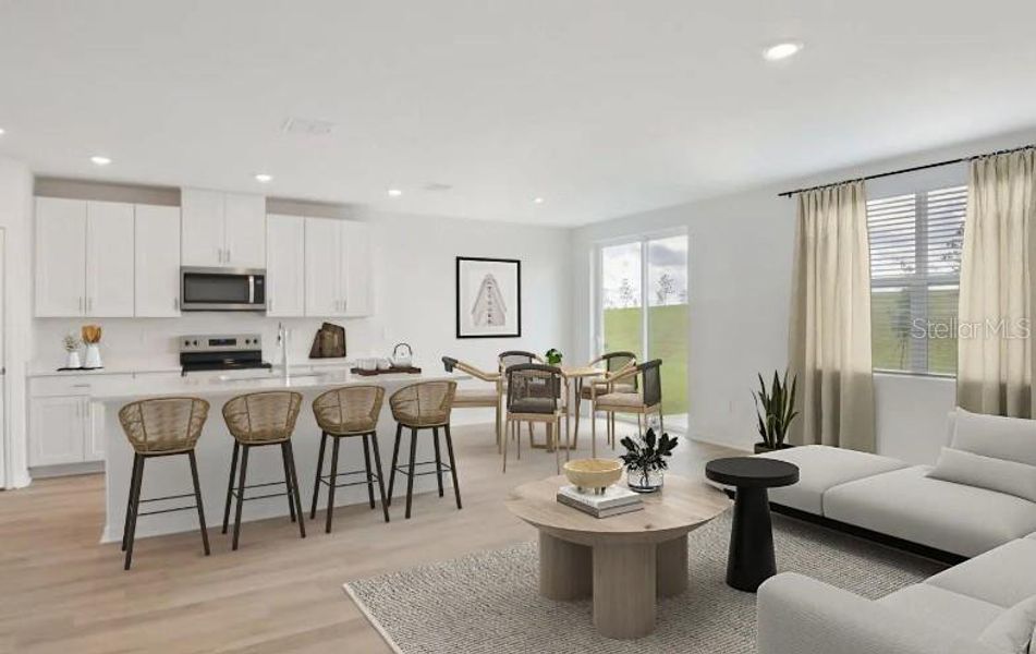 Furnished interior view inside a new home in Hilltop Vistas, Dade City (Image 5).