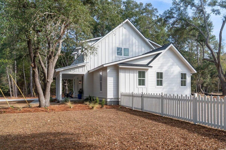 Front exterior of a new home in , Awendaw, SC, highlighting curb appeal (Image 23).