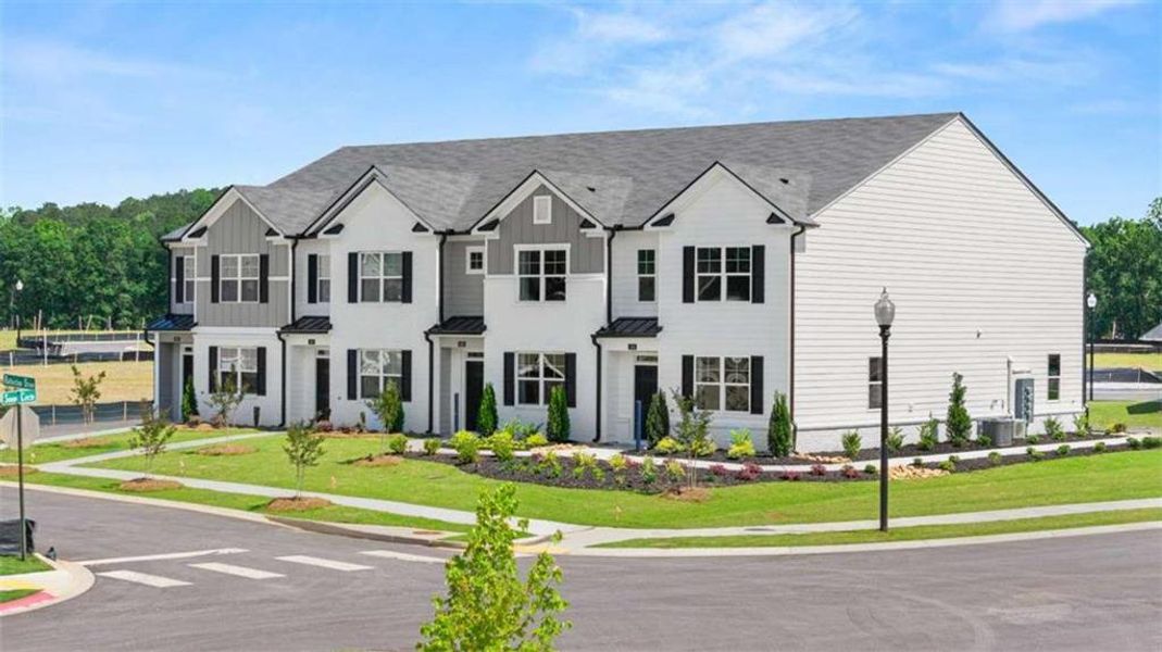 Front exterior of a new home in , Stockbridge, GA, highlighting curb appeal (Image 28).
