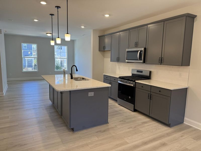 Furnished interior view inside a new home in Enclave at Traditions Townhomes, Wake Forest (Image 6). Furnished interior view inside a new home in Enclave at Traditions Townhomes, Wake Forest (Image 6).