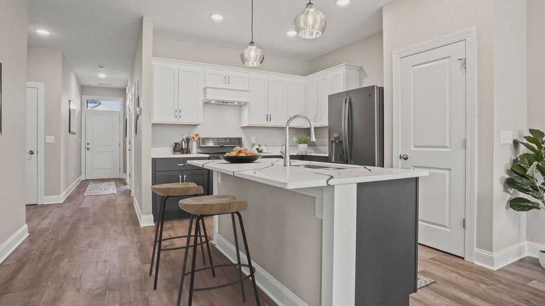 Representative furnished interior of a home built from the Rockaway by Epcon Communities in The Courtyards at Oak Grove, Durham (Image 9).