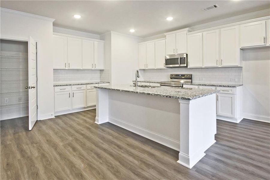 Furnished interior view inside a new home in Somerset at Riverbrook, Gainesville (Image 7). Furnished interior view inside a new home in Somerset at Riverbrook, Gainesville (Image 7).