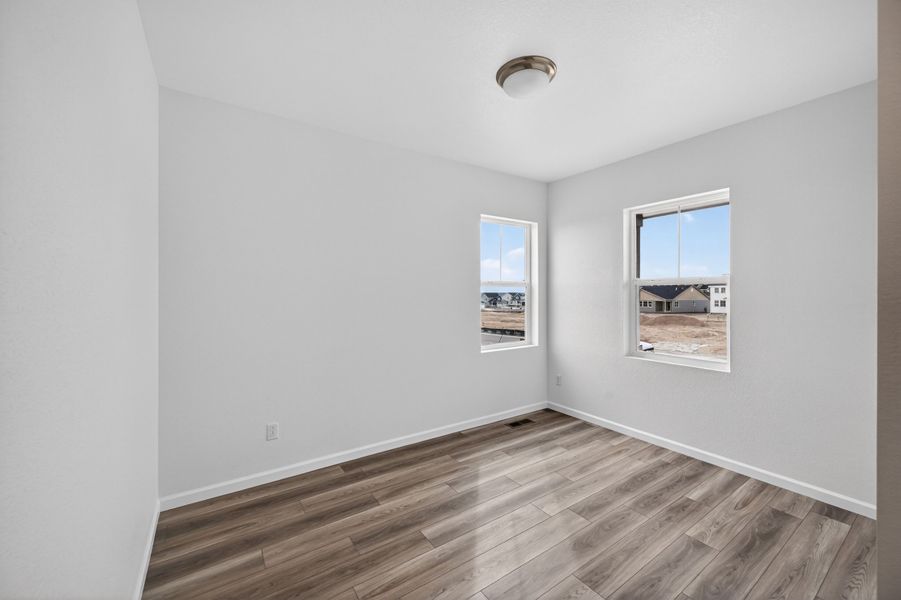 Spacious, unfurnished interior of a new home in The Town Collection at Independence, Elizabeth (Image 11).