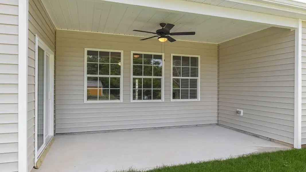 Exterior details and patio area of a home in Villa Grande, Winterville (Image 4).