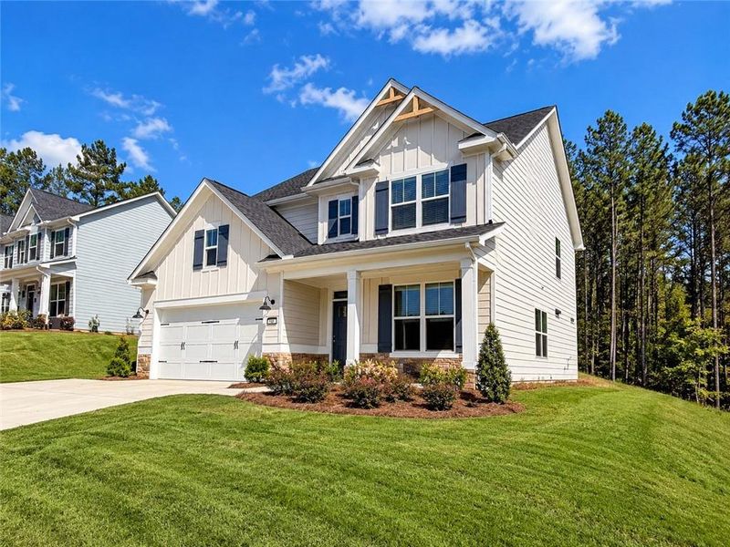 Front exterior of a new home in , Dallas, GA, highlighting curb appeal (Image 23).