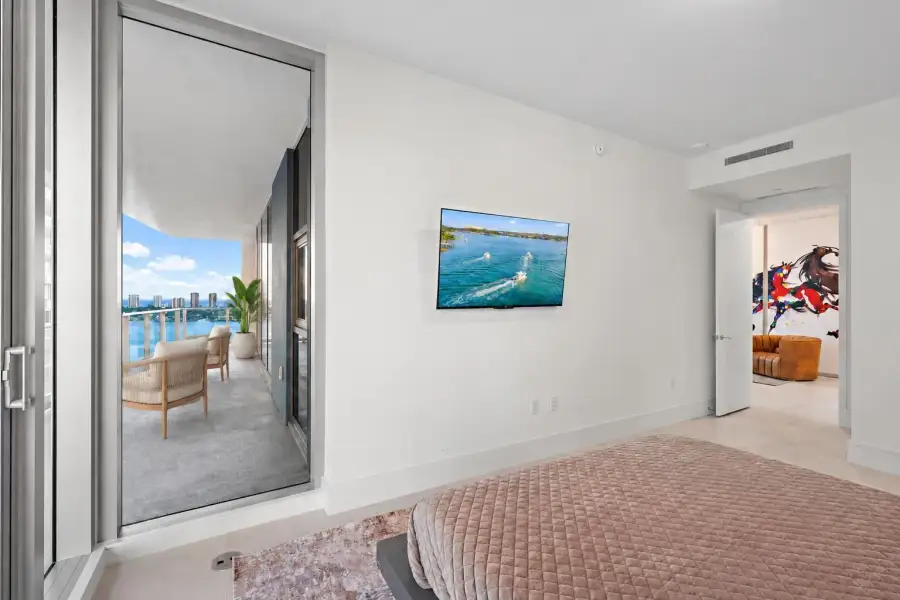 Primary Suite - Balcony Virtually Staged Primary Suite - Balcony Virtually Staged