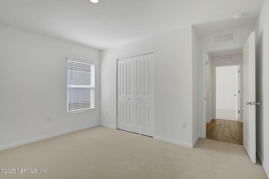 Spacious, unfurnished interior of a new home in Cordova Palms, St. Augustine (Image 13).