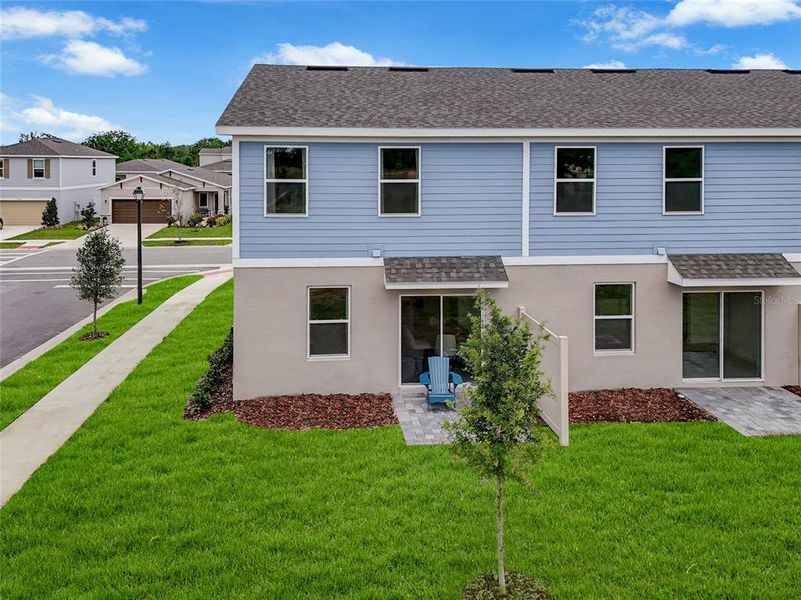 Exterior details and patio area of a home in Avalon Park Tavares Single Family Homes, Tavares (Image 3).