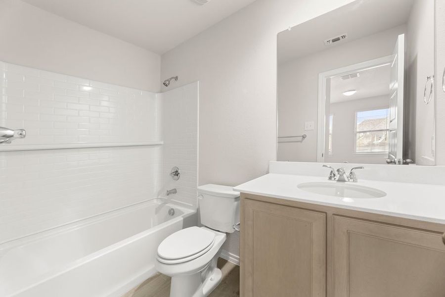 Front exterior of a new home in DeBerry Reserve, Royse City, TX, highlighting curb appeal (Image 8). Front exterior of a new home in DeBerry Reserve, Royse City, TX, highlighting curb appeal (Image 8).