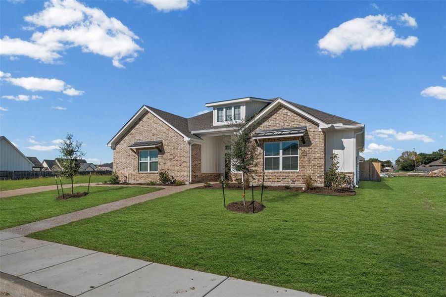 Craftsman inspired home featuring brick siding Craftsman inspired home featuring brick siding