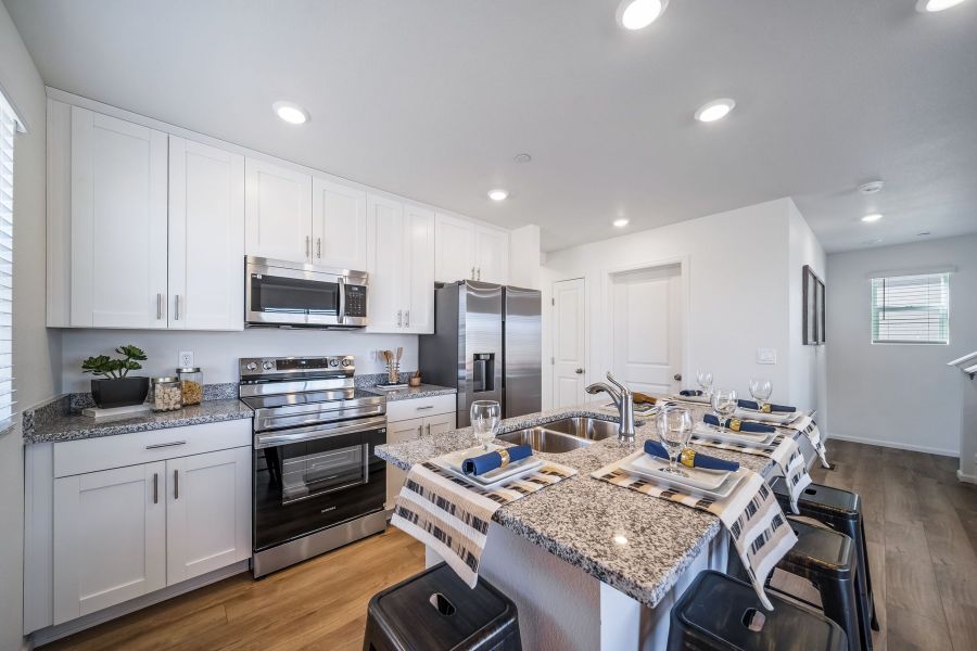 Furnished interior view inside a new home in Reunion, Commerce City (Image 6).