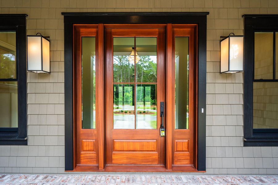 Exterior details and patio area of a home in , Johns Island (Image 3).
