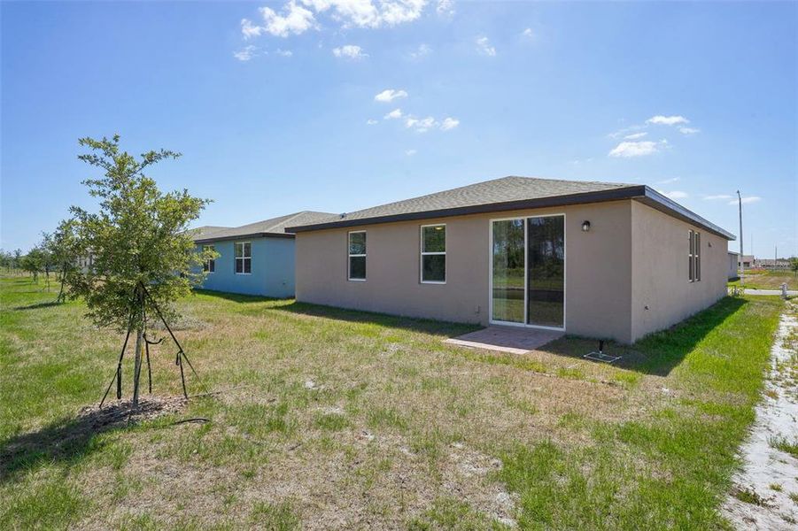 Exterior details and patio area of a home in Lake Deer Estates - Signature Series, Poinciana (Image 23). Exterior details and patio area of a home in Lake Deer Estates - Signature Series, Poinciana (Image 23).