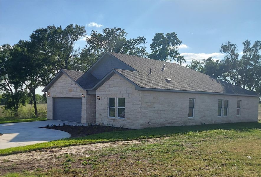 Exterior details and patio area of a home in , Cameron (Image 4).