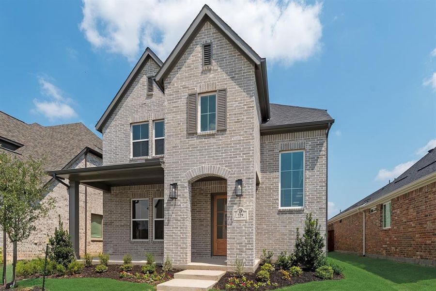 Front exterior of a new home in Light Farms Brenham - 40' Lots, Celina, TX, highlighting curb appeal (Image 24).