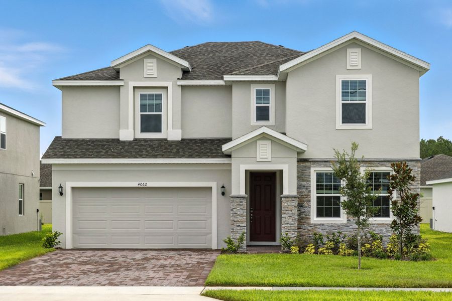Representative exterior photo of a completed home built from the Newcastle by Risewell Homes in Lake Lincoln, Eustis, FL (Image 24).