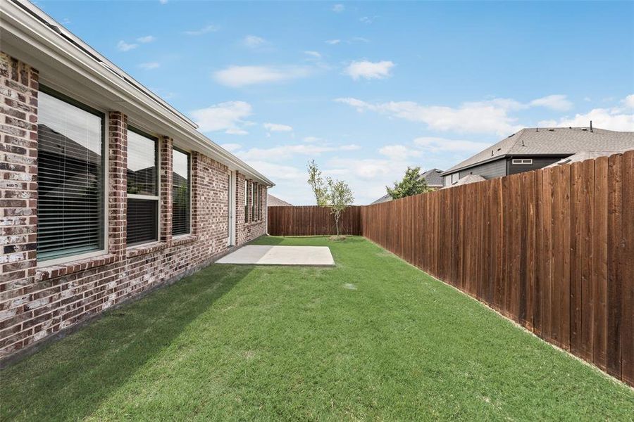 Front exterior of a new home in Villages of Hurricane Creek, Anna, TX, highlighting curb appeal (Image 1). Front exterior of a new home in Villages of Hurricane Creek, Anna, TX, highlighting curb appeal (Image 1).