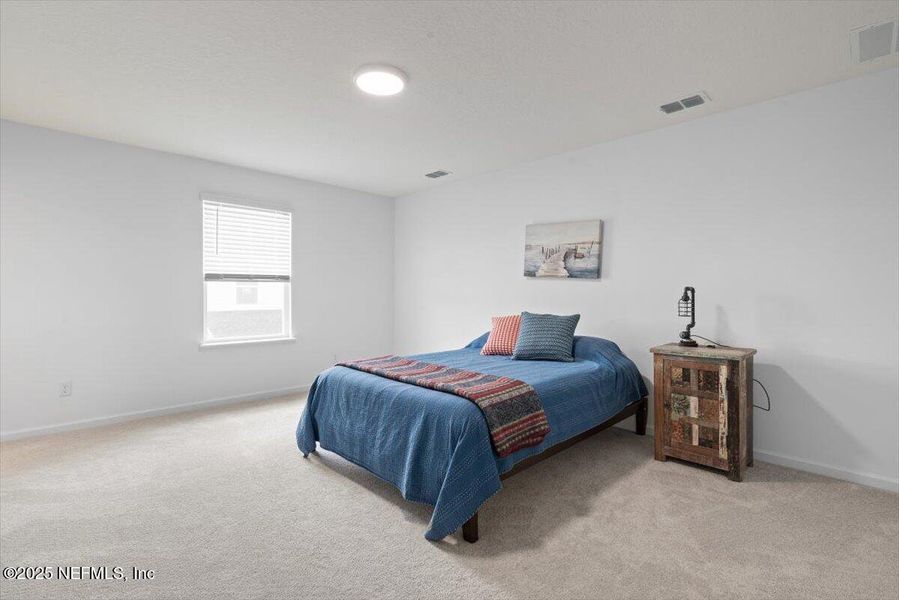 Furnished interior view inside a new home in Hardwick Farms: Hardwick Farms - Townhome Collection, Jacksonville (Image 41).