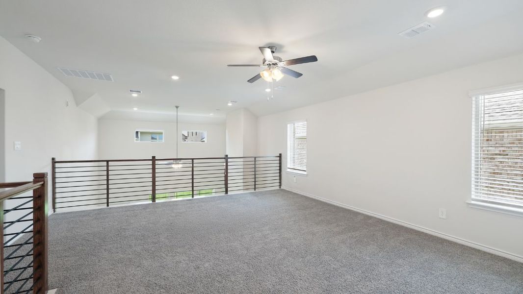 Representative unfurnished interior of a home built from the Burrow by D.R. Horton in The Landing at Hidden Lakes, McKinney (Image 17).