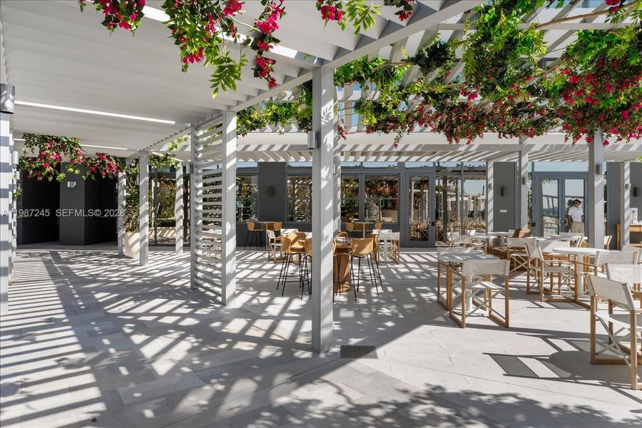 Outdoor Dining at Pool-Deck Restaurant by James Beard Award-Winning Chef Michelle Bernstein Outdoor Dining at Pool-Deck Restaurant by James Beard Award-Winning Chef Michelle Bernstein