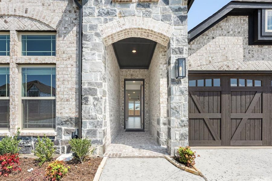 Exterior details and patio area of a home in Parks of Aledo, Aledo (Image 3).
