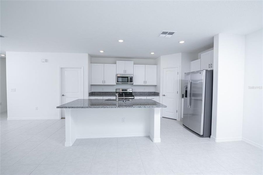 Furnished interior view inside a new home in Saddle Creek Preserve: The Manors II, Lakeland (Image 10).