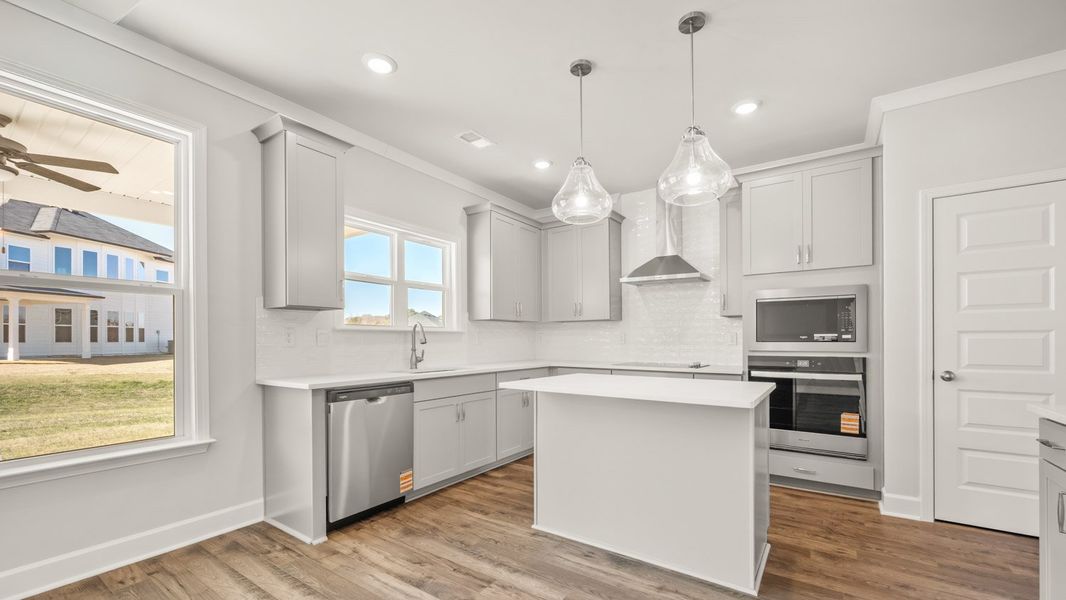Representative furnished interior of a home built from the Packard by D.R. Horton in Evergreen Crossing, Locust Grove (Image 6).