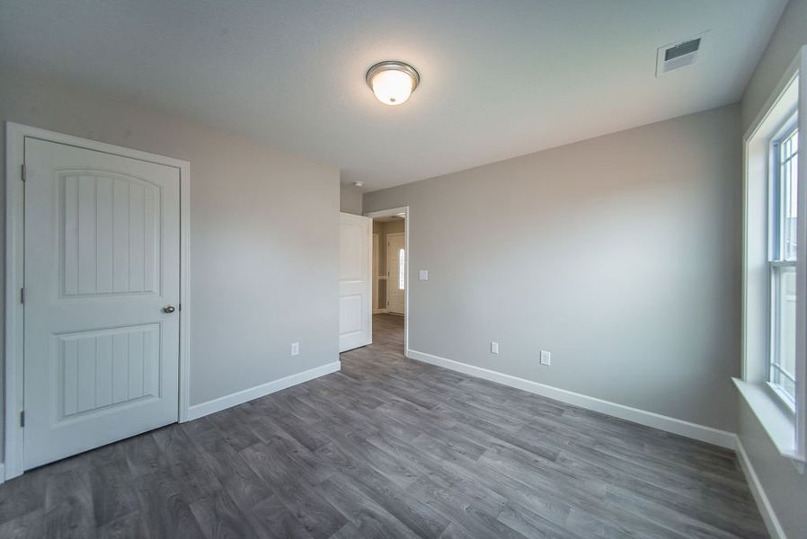 Representative unfurnished interior of a home built from the Beaumont by Enchanted Homes in Guadalupe Heights, Seguin (Image 33).