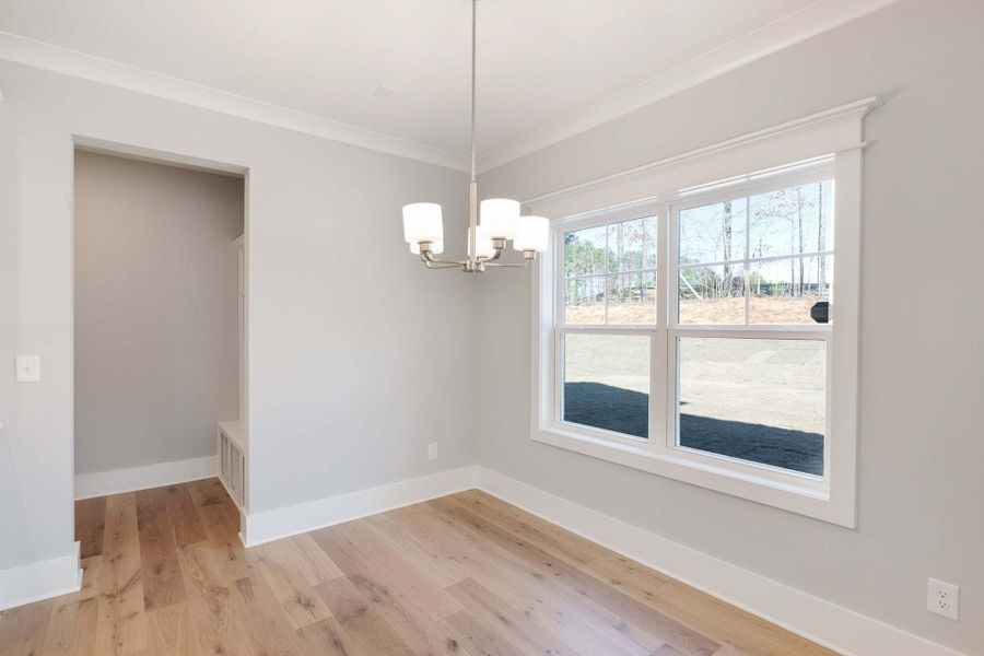 Representative unfurnished interior of a home built from the Austin by Caviness & Cates Communities in Bartlett Manor, Youngsville (Image 121).