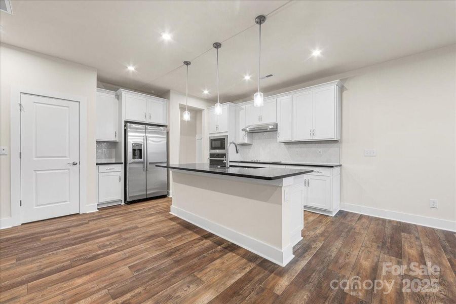 Gourmet Kitchen with Designer Selected Finishes.