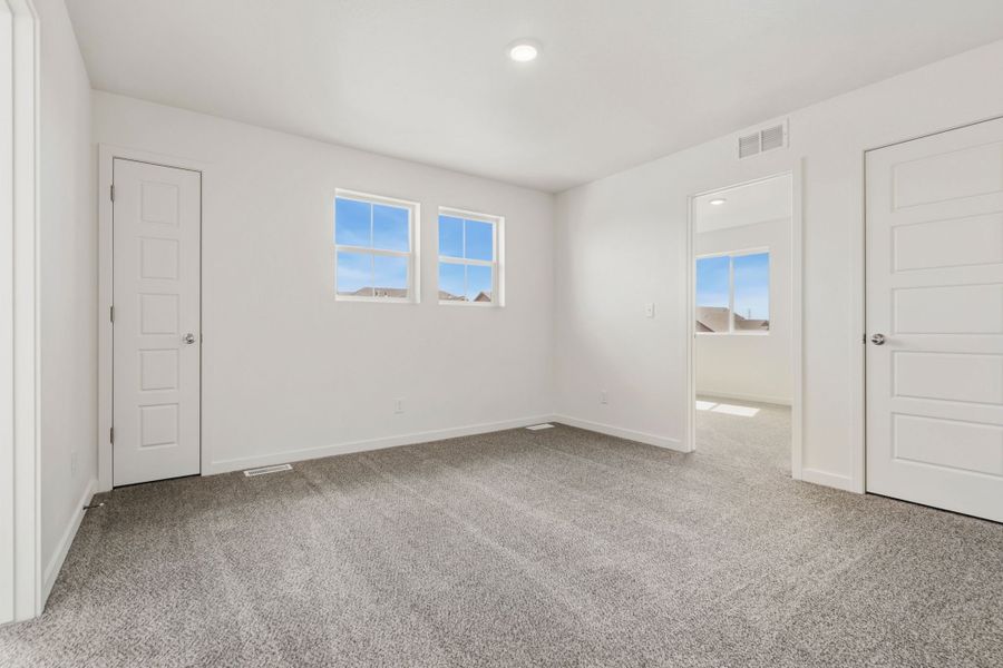 Spacious, unfurnished interior of a new home in Union Colony West, Greeley (Image 14).