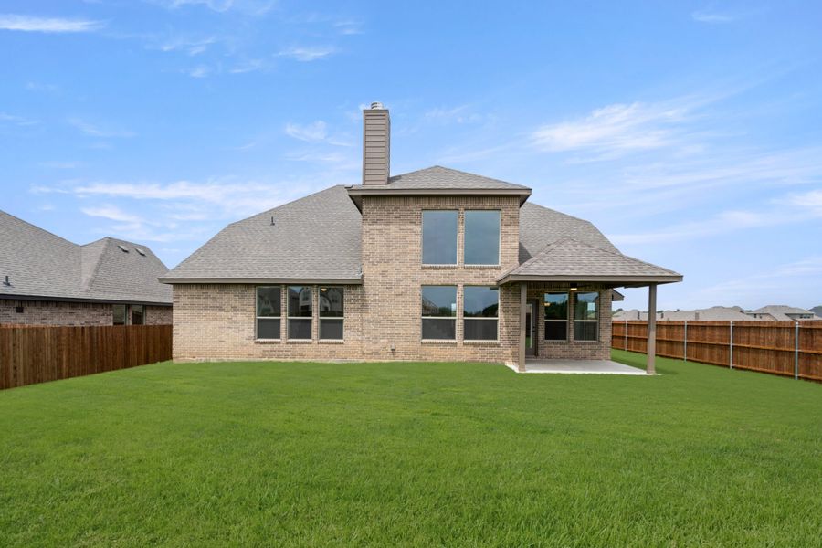 Front exterior of a new home in Mockingbird Hills, Joshua, TX, highlighting curb appeal (Image 27).