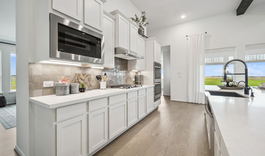 Kitchen with fabulous ceramic tile backsplash