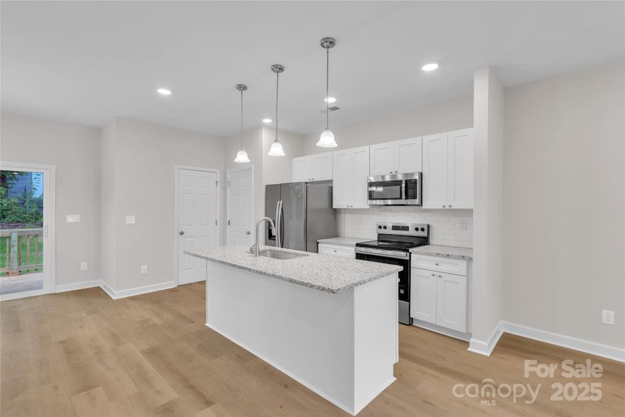 Furnished interior view inside a new home in , Statesville (Image 12).