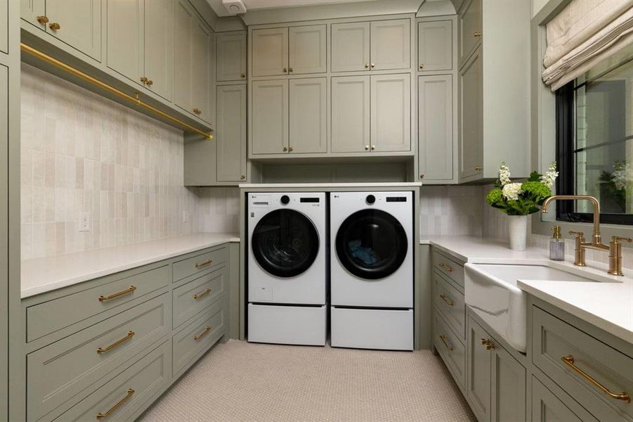 The downstairs laundry room is beautiful and conveniently located just off the large mud room.