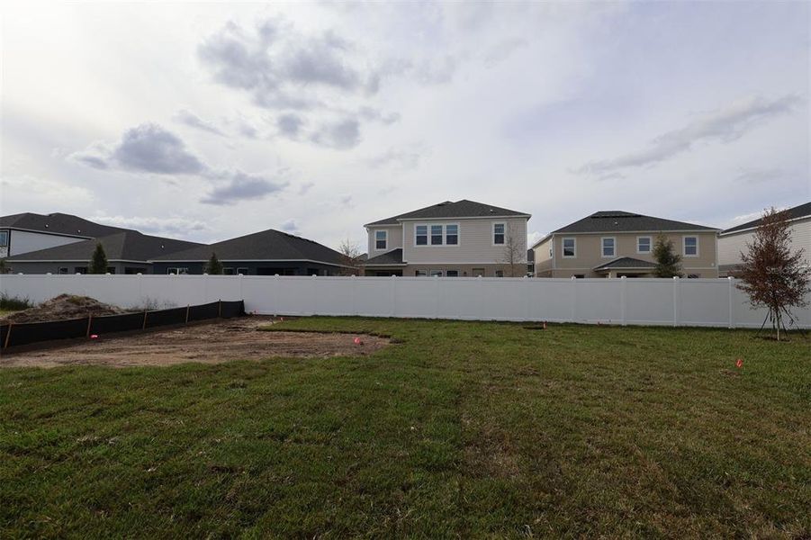 Exterior details and patio area of a home in Estates at Rivercrest, Sanford (Image 2). Exterior details and patio area of a home in Estates at Rivercrest, Sanford (Image 2).