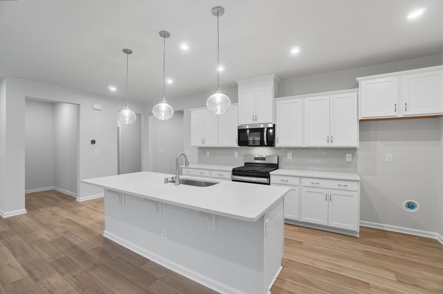 Furnished interior view inside a new home in Waxhaw Landing, Monroe (Image 5).