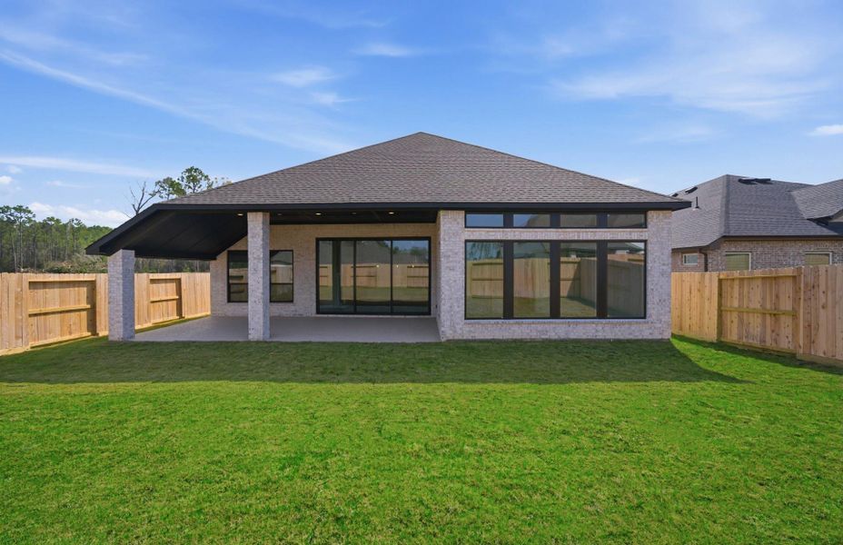 Exterior details and patio area of a home in The Highlands 55′, Porter (Image 27).