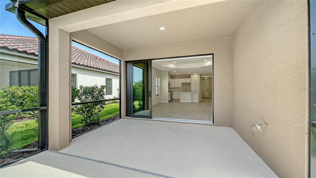 Exterior details and patio area of a home in Vicenza Real Estate and Homes for Sale in North Venice, FL - Neal Communities, Nokomis (Image 23).