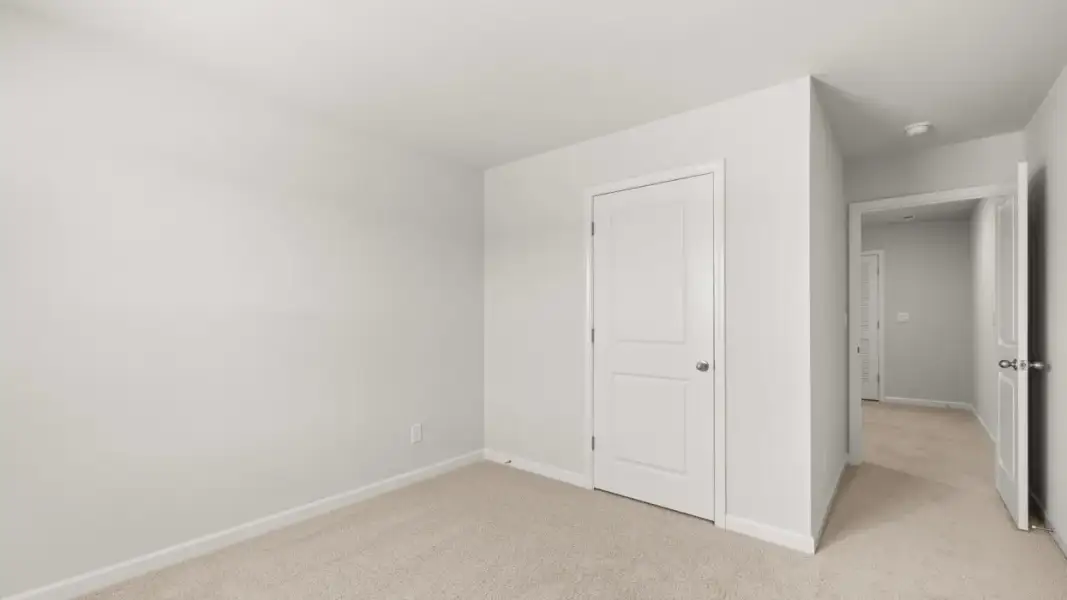 Representative unfurnished interior of a home built from the Pattison by D.R. Horton in Branford Crossing, Stockbridge (Image 19).