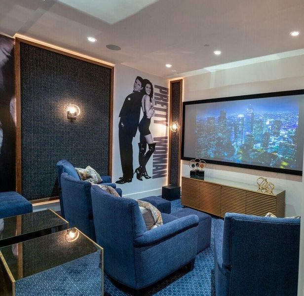 Private home theater designed for an immersive entertainment experience.*Images depict previously completed homes by Roberson Building Group and are intended solely to showcase builder quality and craftsmanship.