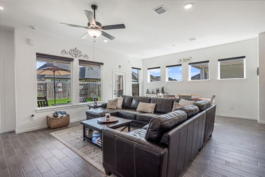The natural light brings the warm cozy feeling of this amazing open living space.