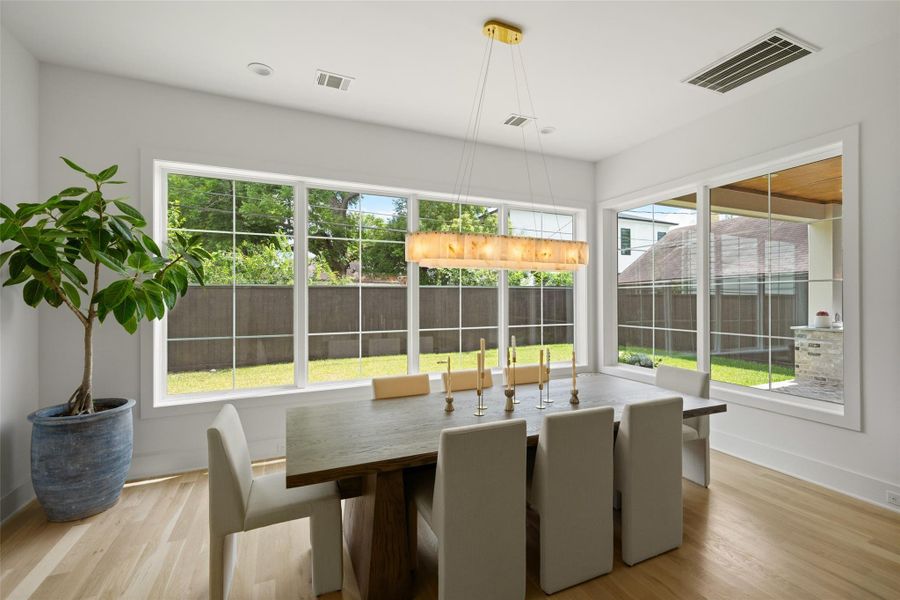 DINING ROOM WITH WRAP AROUND WINDOWS DINING ROOM WITH WRAP AROUND WINDOWS