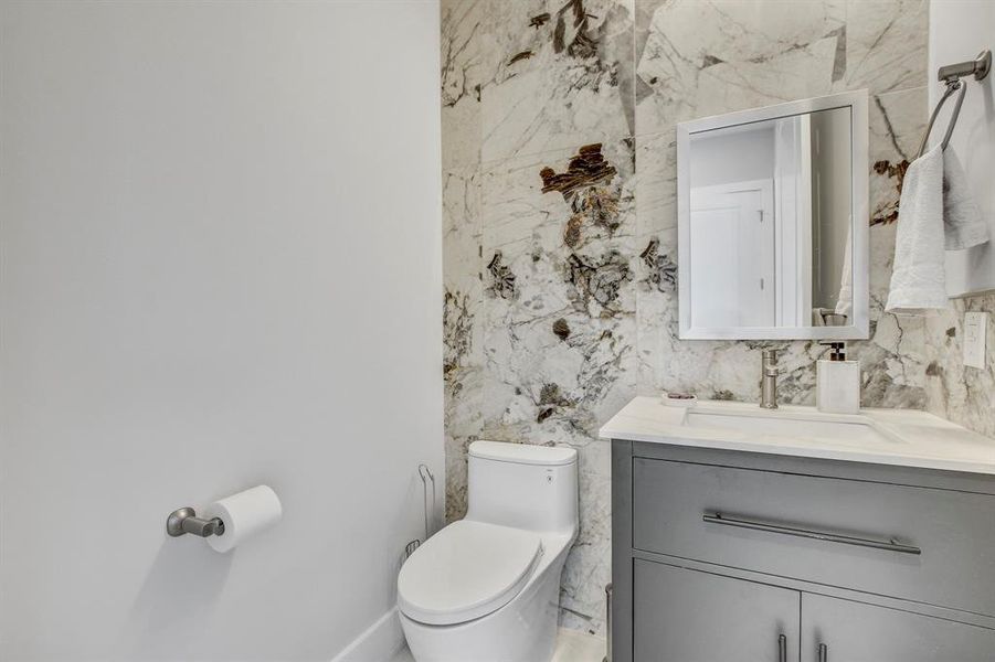 Bathroom with vanity and toilet