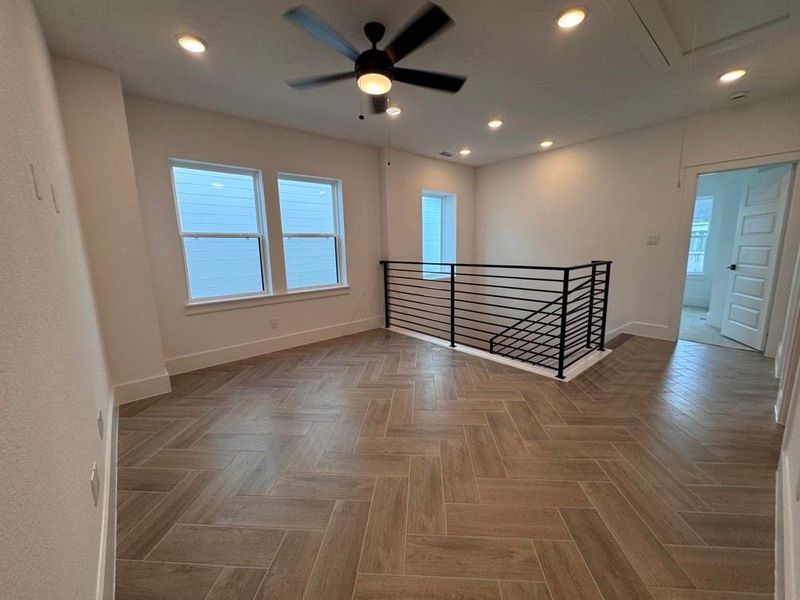 Spacious, unfurnished interior of a new home in Easthaven at Bridgeland Central - Vision Collection, Cypress (Image 26).